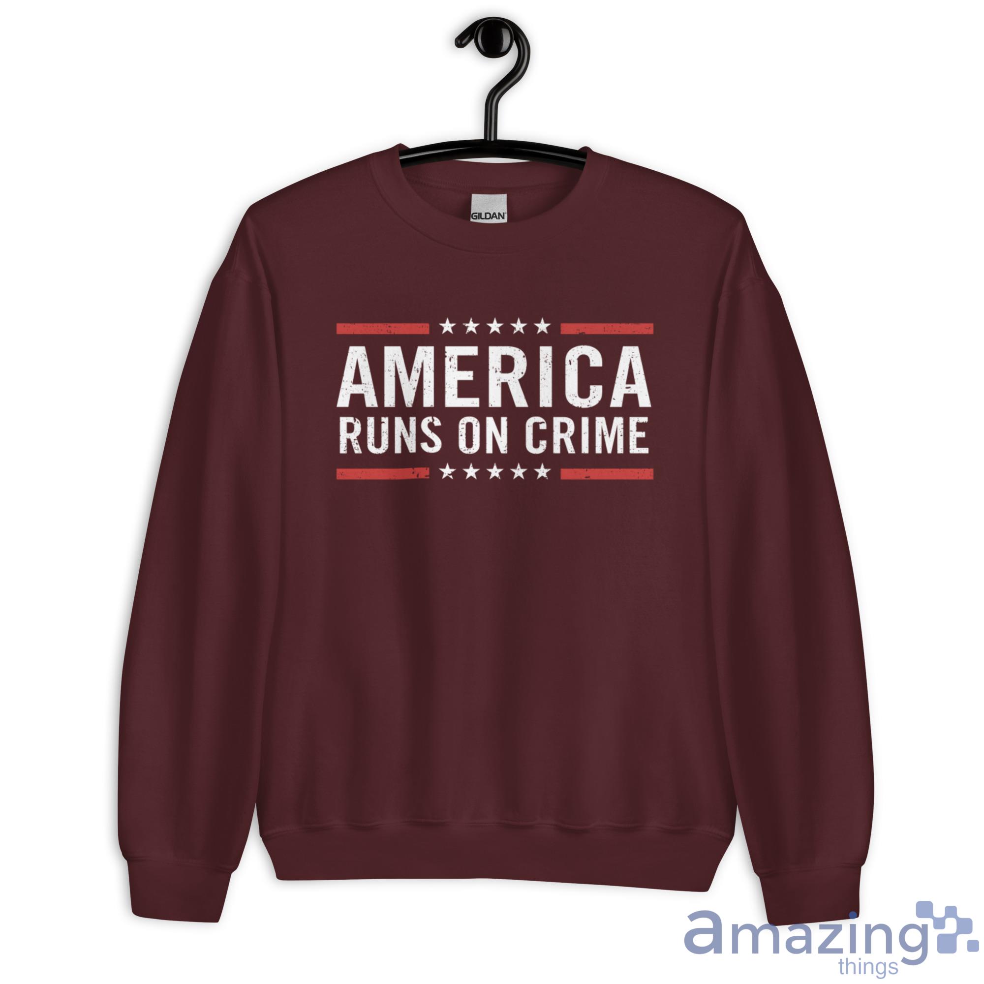America Runs On Crime Shirt image America Runs On Crime Shirt - Unisex Heavy Blend Crewneck Sweatshirt-1
