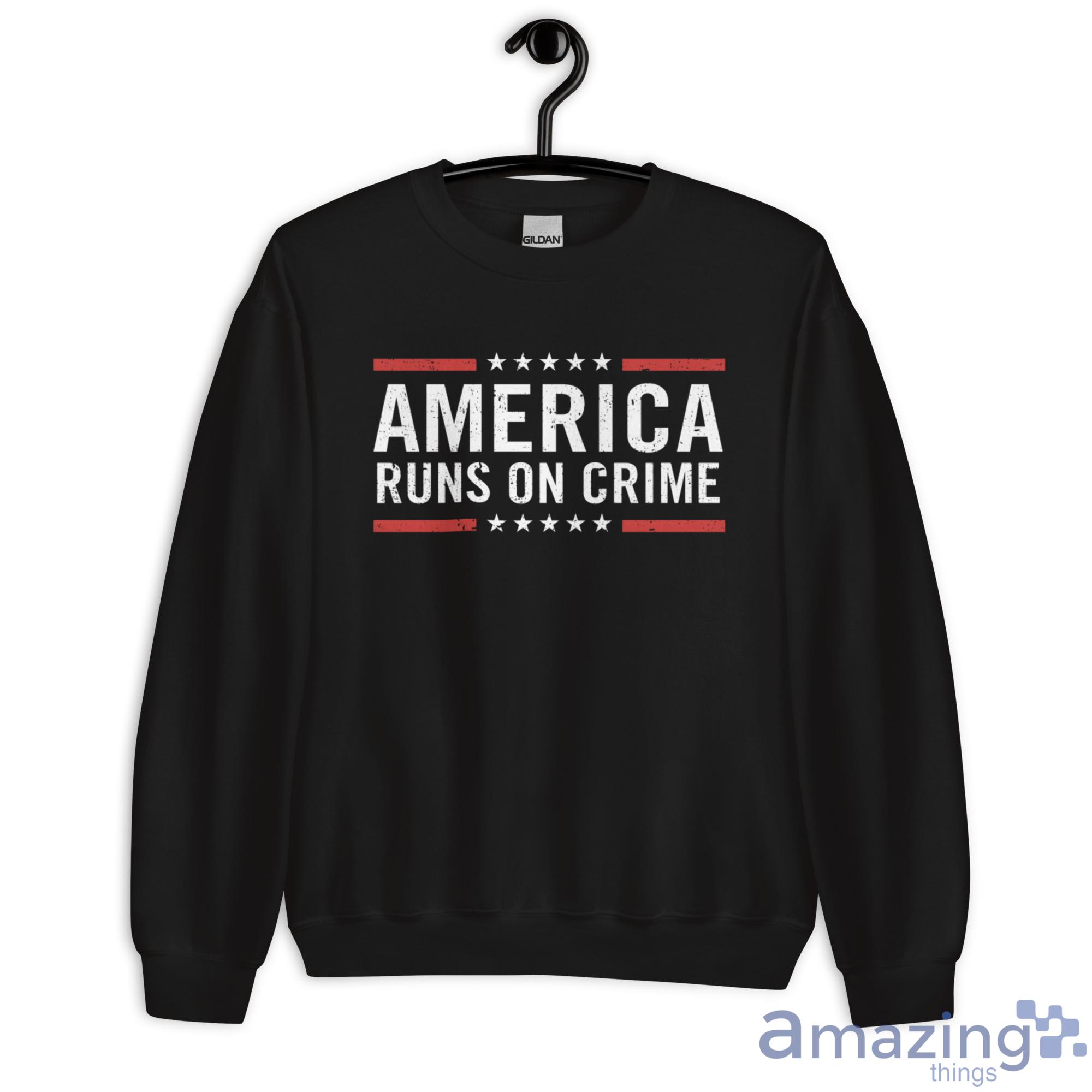 America Runs On Crime Shirt image America Runs On Crime Shirt - Unisex Heavy Blend Crewneck Sweatshirt