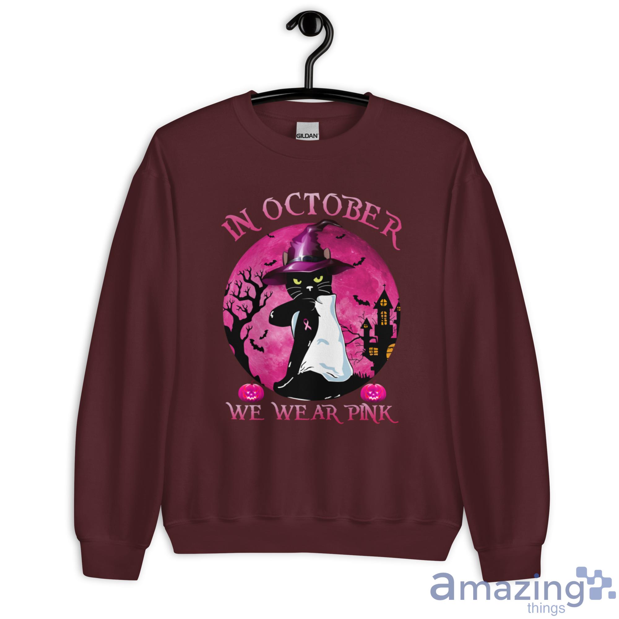 Breast Cancer Black Cat Witch In October We Wear Pink Halloween Shirt image Breast Cancer Black Cat Witch In October We Wear Pink Halloween Shirt - Unisex Heavy Blend Crewneck Sweatshirt-1
