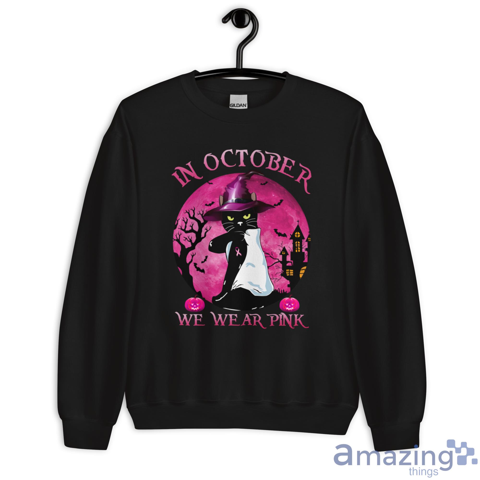 Breast Cancer Black Cat Witch In October We Wear Pink Halloween Shirt image Breast Cancer Black Cat Witch In October We Wear Pink Halloween Shirt - Unisex Heavy Blend Crewneck Sweatshirt