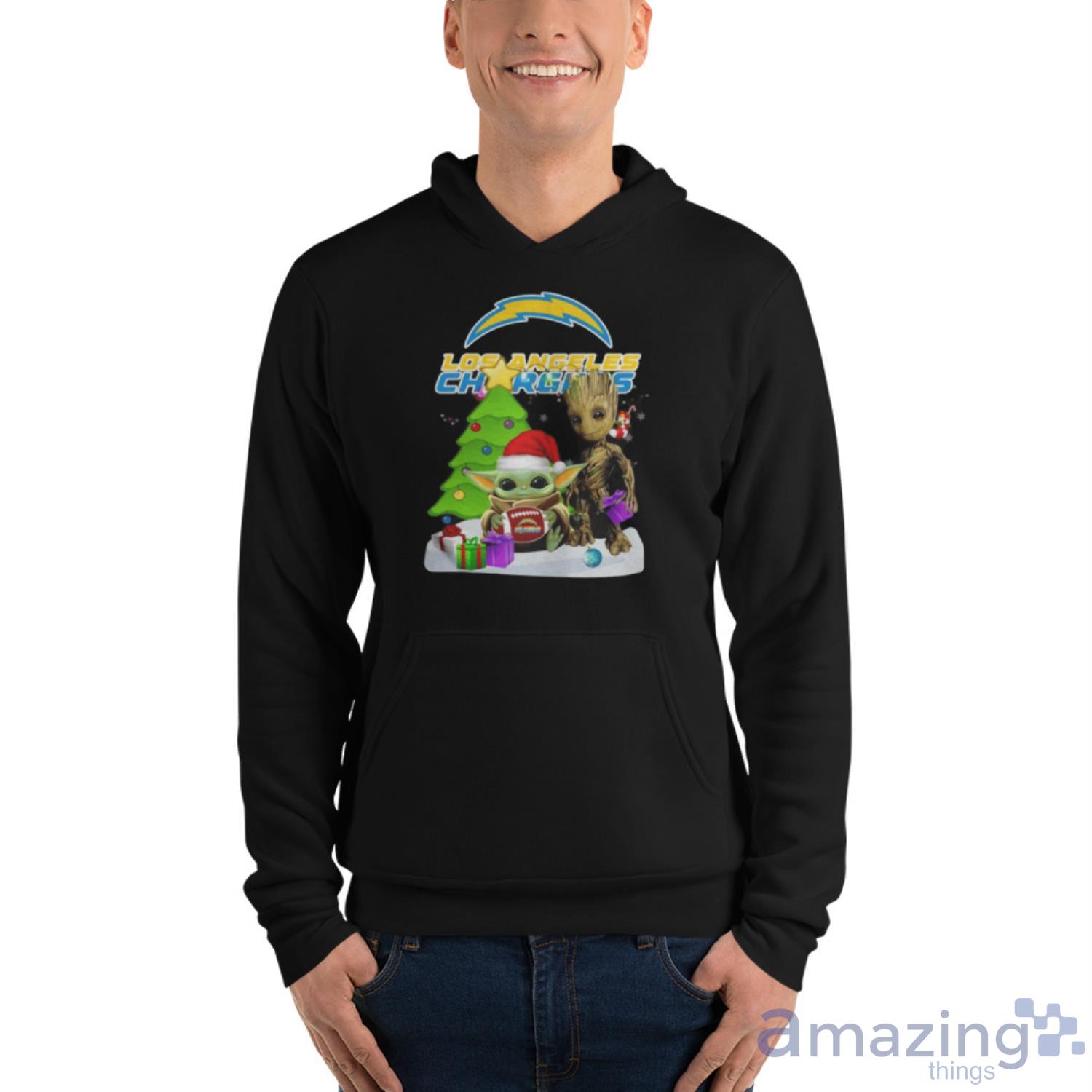 Santa Bigfoot And Baby Yoda Hug Los Angeles Chargers Snow Christmas Tree Shirt image Santa Bigfoot And Baby Yoda Hug Los Angeles Chargers Snow Christmas Tree Shirt - Unisex Fleece Pullover Hoodie