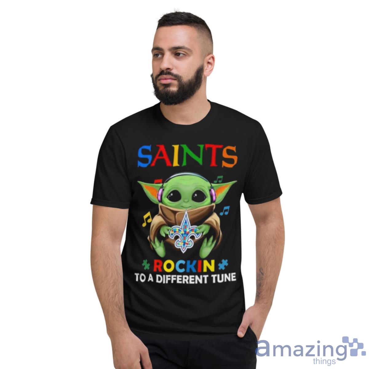 Baby Yoda Hug New Orleans Saints Autism Rockin To A Different Tune Shirt - Short Sleeve T-Shirt