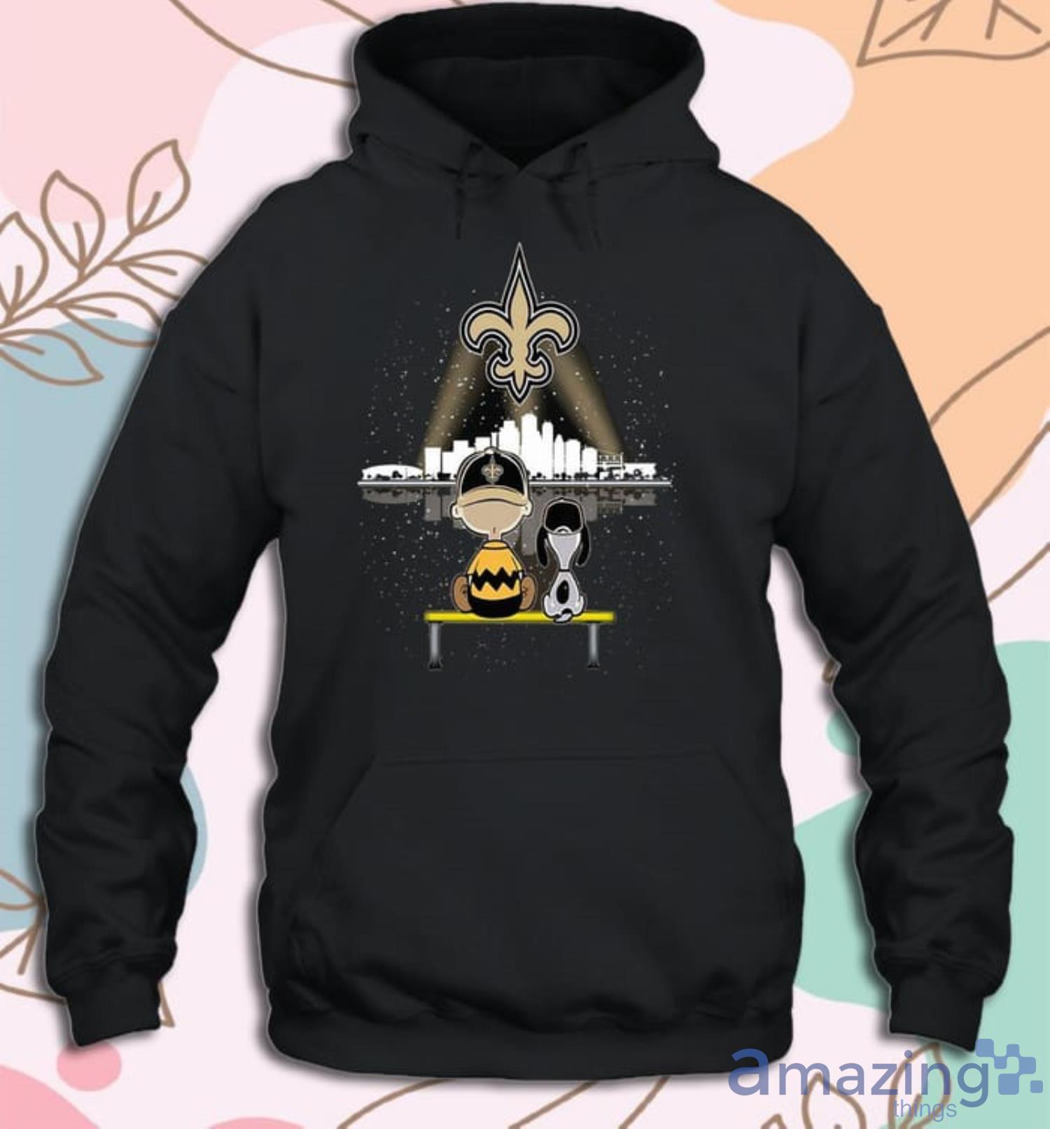 Charlie Brown And Snoopy Dog Watching City New Orleans Saints T-shirt Product Photo 1
