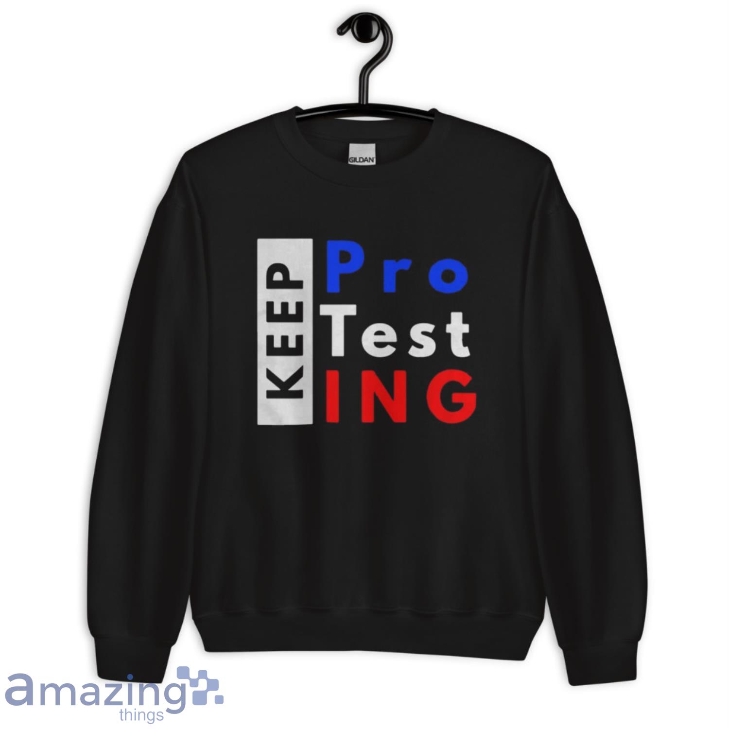 Official Keep Protesting Premium Shirt image Official Keep Protesting Premium Shirt - Unisex Crewneck Sweatshirt
