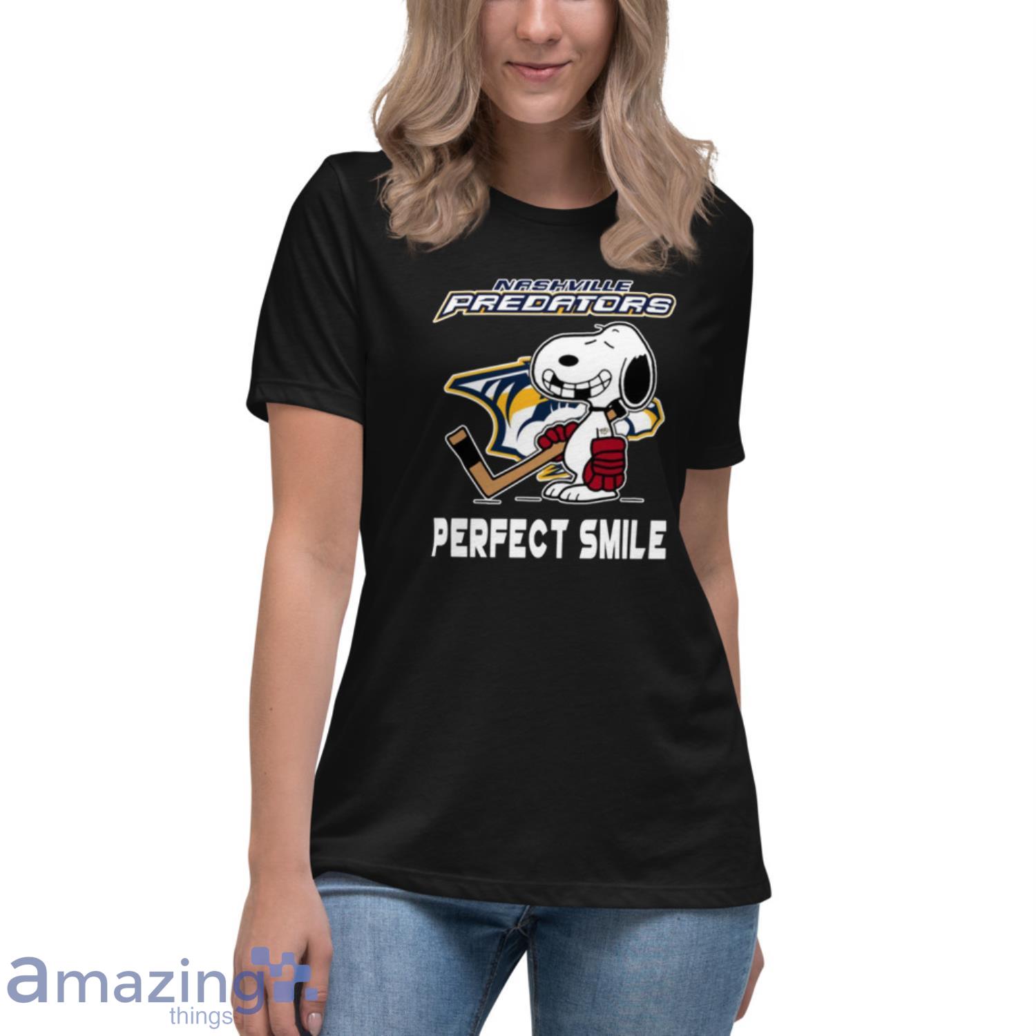 NHL Nashville Predators Snoopy Perfect Smile The Peanuts Movie Hockey T Shirt image NHL Nashville Predators Snoopy Perfect Smile The Peanuts Movie Hockey T Shirt - Womens Relaxed Short Sleeve Jersey Tee