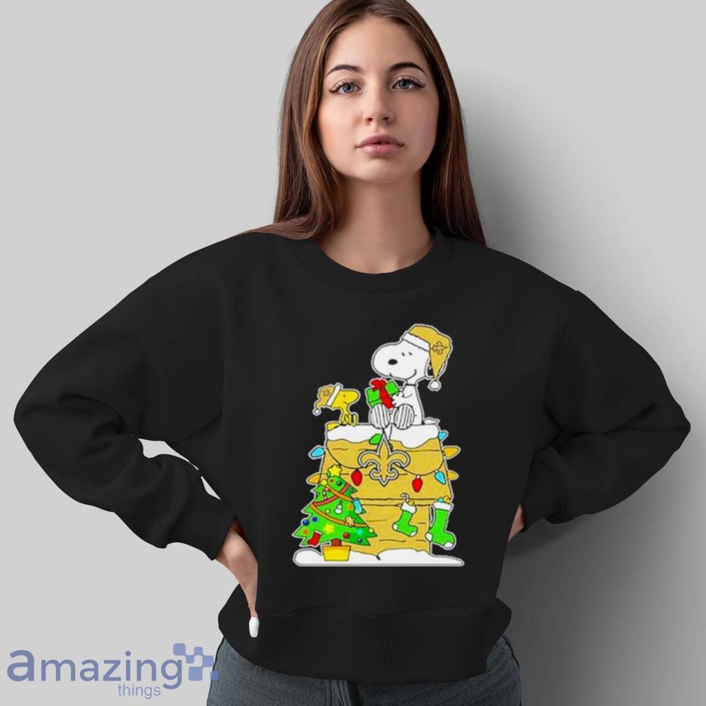 A Happy Christmas With New Orleans Saints Snoopy T-Shirt - T-shirts Low  Price