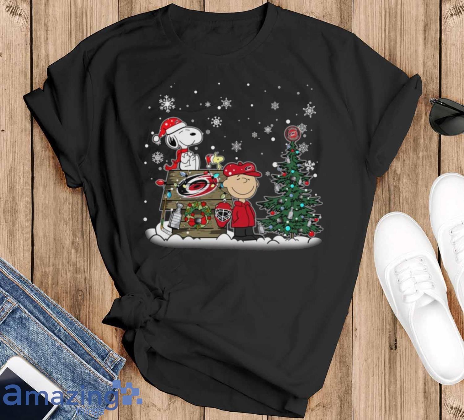 NHL Carolina Hurricanes Snoopy Charlie Brown Woodstock Christmas Stanley Cup Hockey T Shirt Christmas Gift - Black T-Shirt