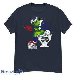 New England Patriots Grinch Sitting On New York Jets Toilet And Step On Miami Dolphins Helmet T Shirt Product Photo 2