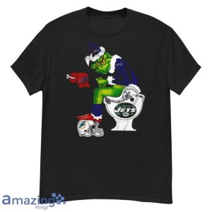 New England Patriots Grinch Sitting On New York Jets Toilet And Step On Miami Dolphins Helmet T Shirt Product Photo 1