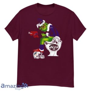 New England Patriots Grinch Sitting On New York Jets Toilet And Step On Miami Dolphins Helmet T Shirt Product Photo 5